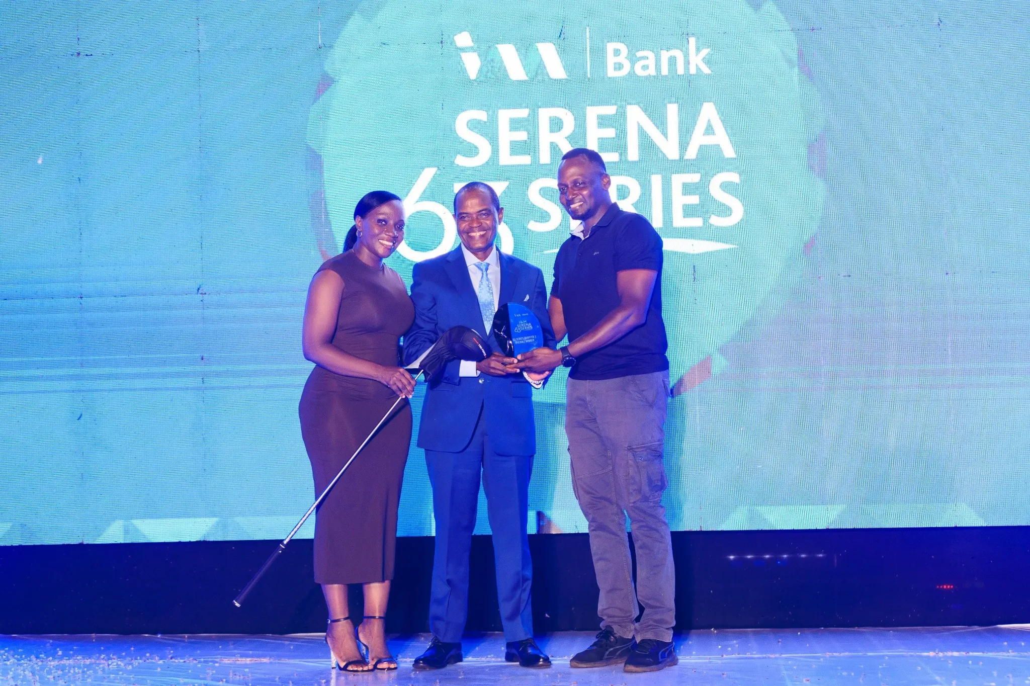 Dr. Sebbaale Kato receiving an award at the I&M Bank Serena 63 Golf Series